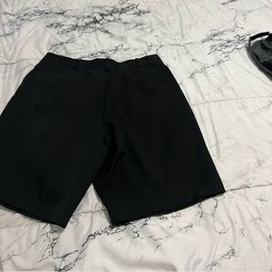 36*32 black Nike golf shorts.